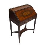 An Edwardian satinwood and inlaid lady's bureau with pierced brass galleried top and floral