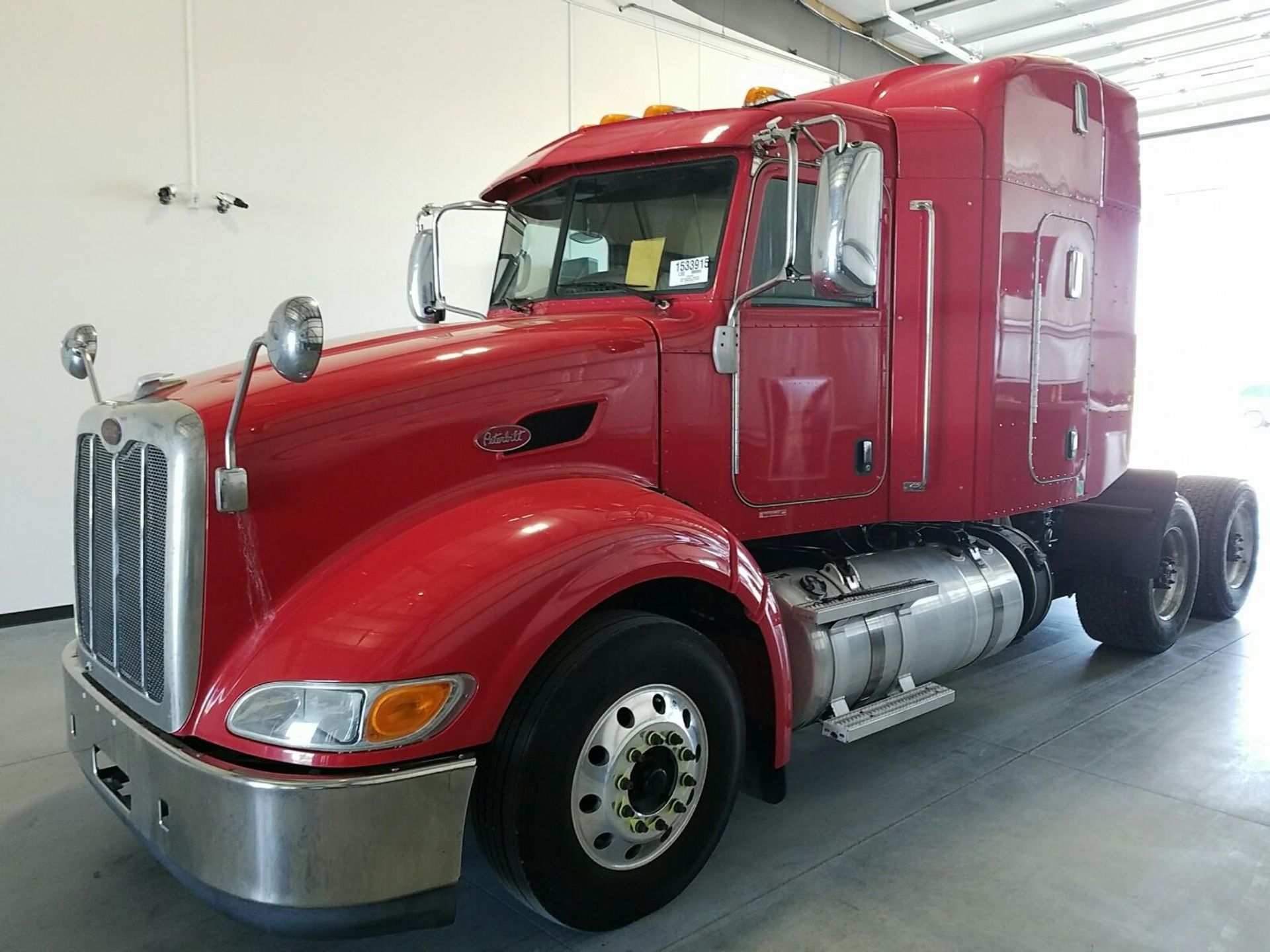 Unit 3437 - 2013 Peterbilt - Red - VIN#1XPHD49X8DD182056 - 491,529 miles