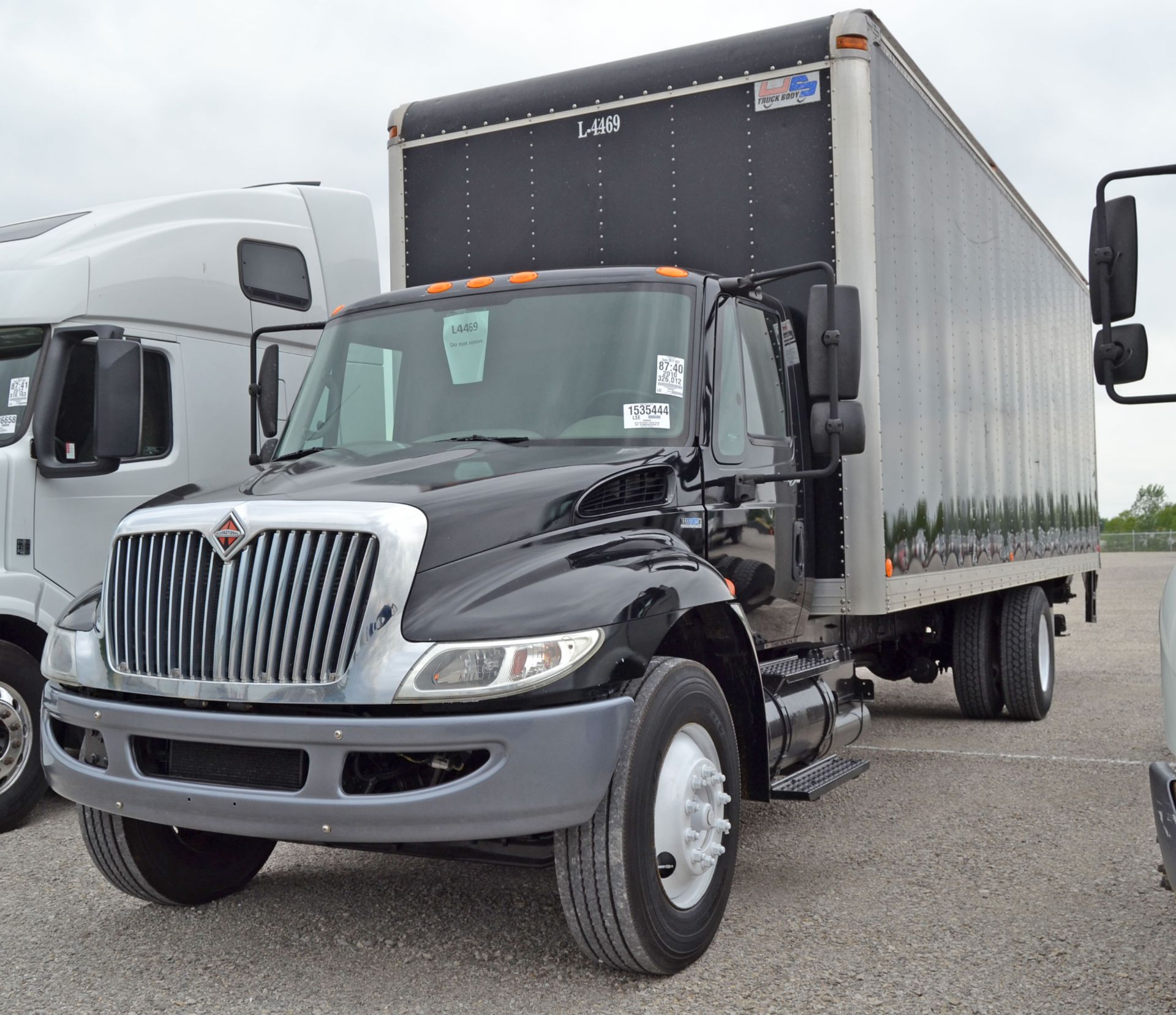 Unit L-4469 - 2010 Int’l 4300/CDL - Black - VIN# 1HTMMAAN2AH206173 - 326,012 miles