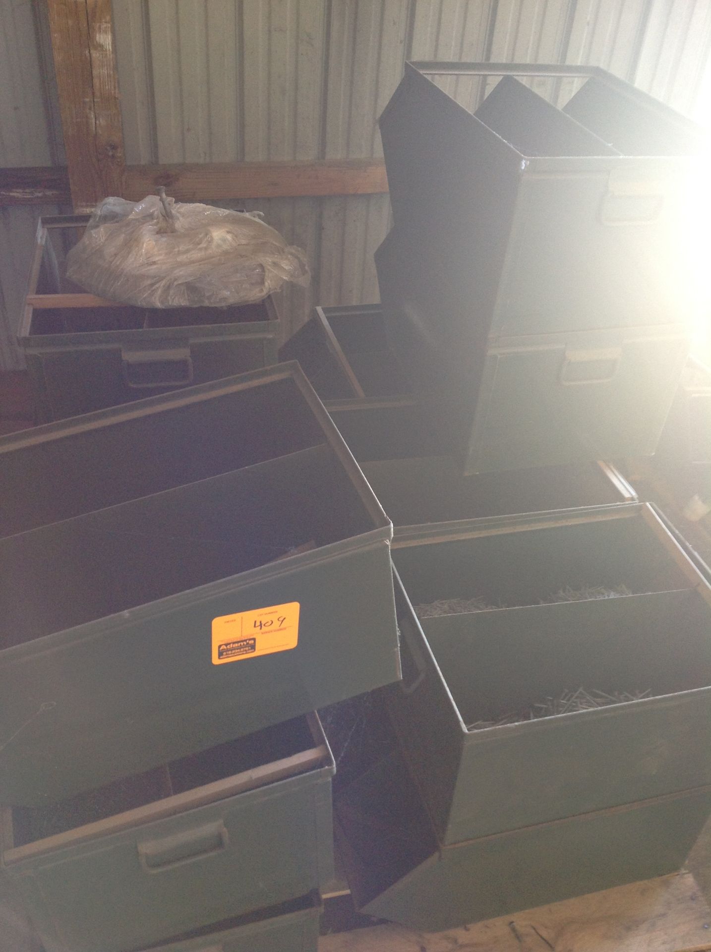 Green Metal Bins containing misc Nails