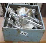 Box of replacement knees and hips in titanium