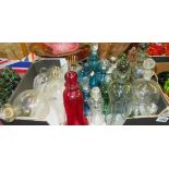 Large collection of waisted decanters