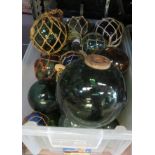 Large box of glass fishing floats