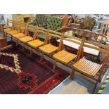 Eight folding wood chairs