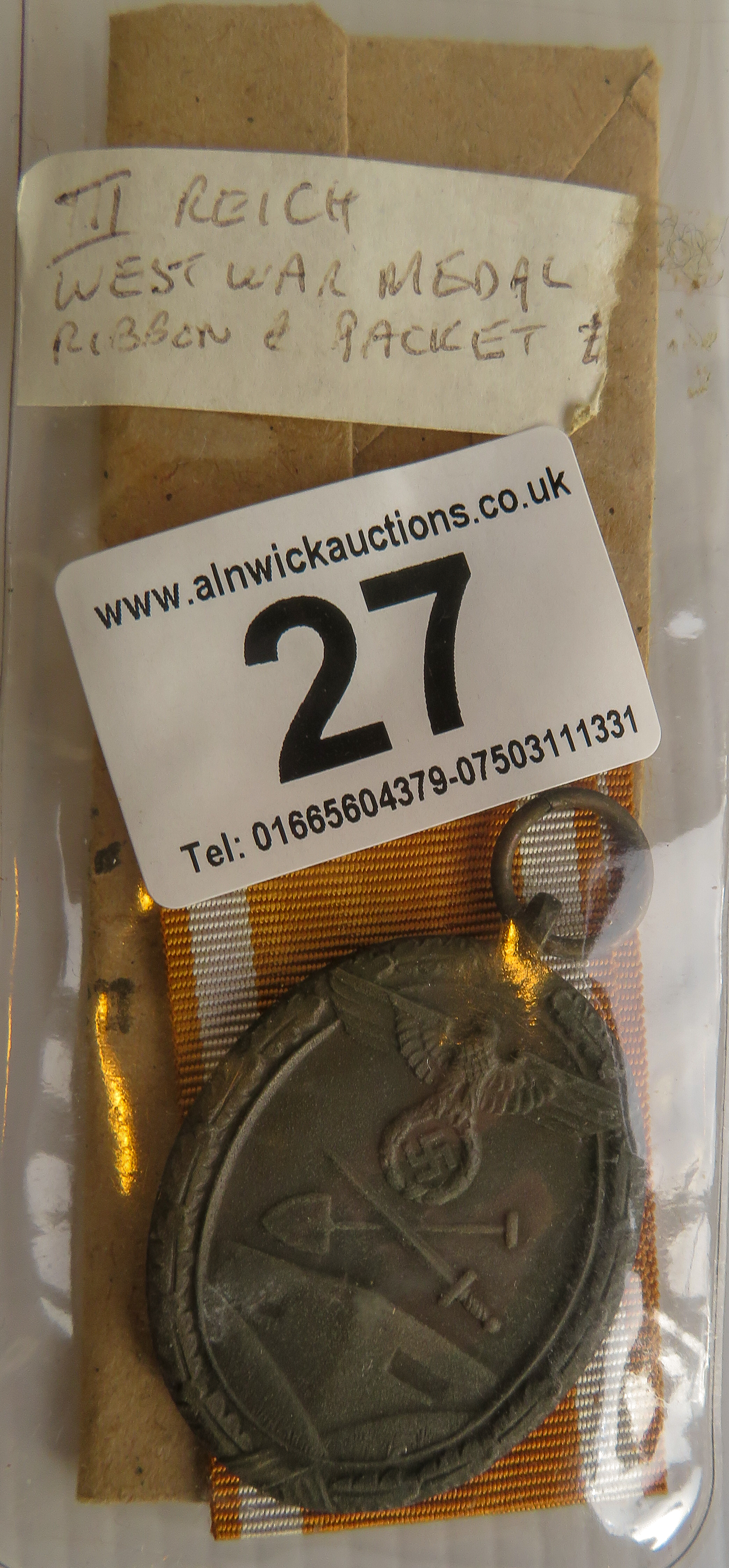 Third Reich West war medal, ribbon and packet