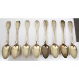 A set of eight Scottish silver fiddle pattern table spoons, Edinburgh 1810-1811, maker's mark J.