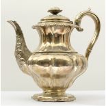 A silver melon pattern teapot with foliate decoration by Emes & Barnard, London 1825, 24cm high