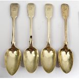 Four table spoons and seven dessert spoons, fiddle pattern, together with ten table forks and