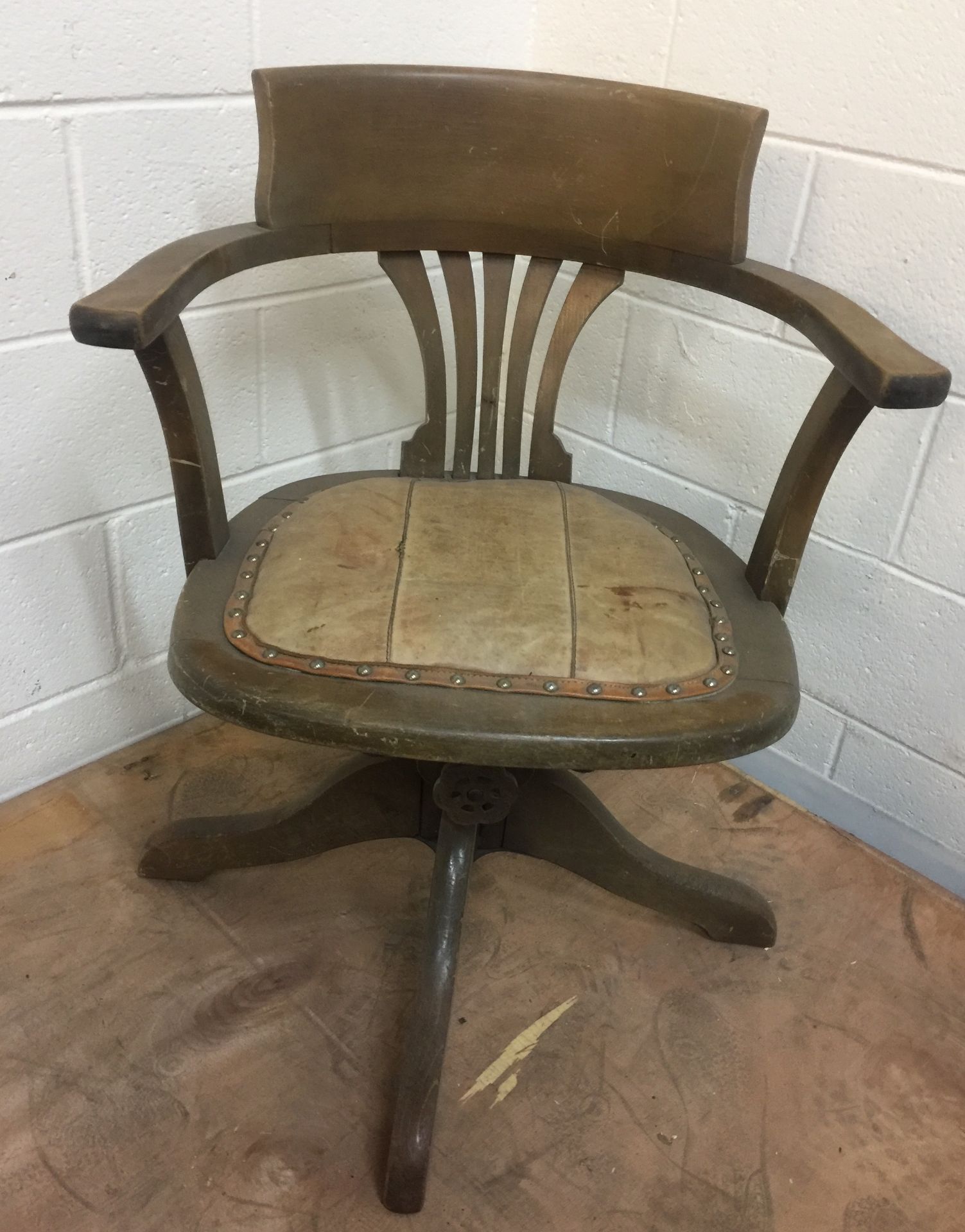 HUGHLY VALUABLE ANTIQUE OFFICE CHAIR