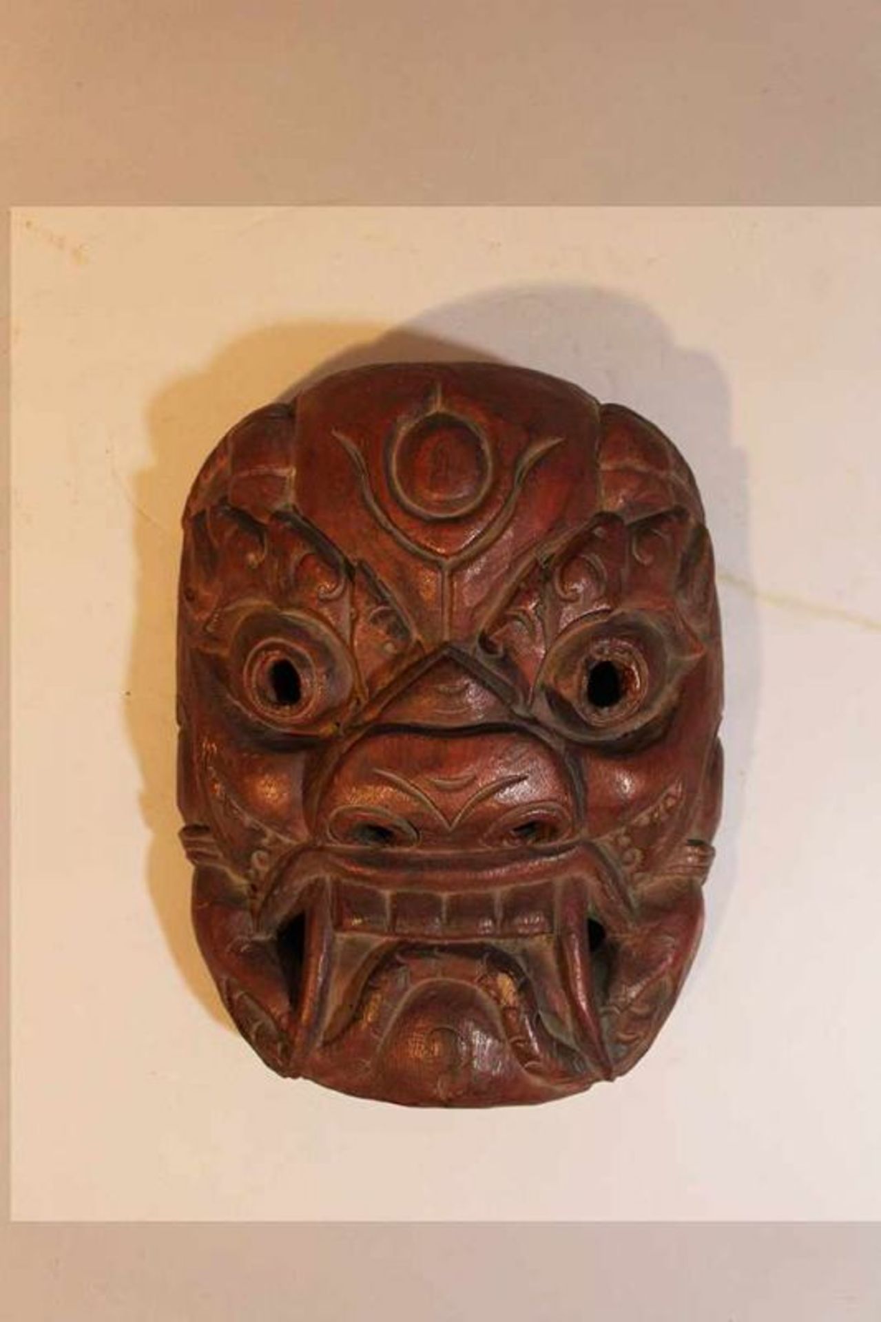 Dhatmapala mask Dhatmapala mask, wood carved with open work eyes, original patina, possibly Tibet