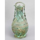 Archaic bronze vase in Song manner (960-1279), pear shape on round bronze ring base, with three