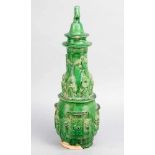 Chinese ceremonial ceramic object, in conical round shape, with several figures in half relief; on