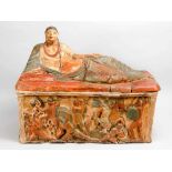 An Etruscan terracotta sarcophagus, rectangular shape with sculpted portraits of warriors of