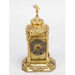 South German clock in form of a tower on octagonal stepped base with fruit decorations and four