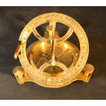 Large sun dial with compass, in gilded bronze mantle, with engraved Roman numbers and scale, wind