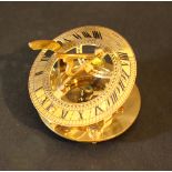 Sundial with compass, bronze gilded with sunwatch and engraved Roman numbers, adjustable feet and