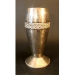 German silver goblet in baluster shape with wide round foot and middle decoration band; silver