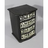 Small Italian miniature commode with four bowed drawers, with rich ebony and ivory intarsias; 18th/