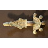 A rare Early Medieval Merovingian radiate headed bow brooch; decorated with circles and