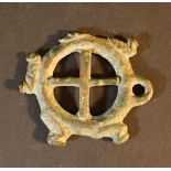 A bronze amulet in shape of a wheel with five ducks decorated, possibly Celtic 1st-2nd Century b.C.