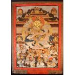 A large thangka painted on textile, partly gilded, with textile frame (textile cover missing); on