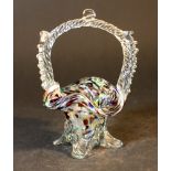 Venetian glass basket, with hand grip, multicoloured and transparent glass; Murano around 1950.