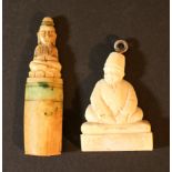 Lot of two items: 1st. Chinese Buddha figure on half round base; white jade partly green coloured