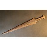 Earth found dagger with conical plate and decorated hand grip; iron, partly rusty; possibly Black
