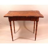 A Louis XVI game table on four bamboo simluating carved legs with drawer, canted broder and top;