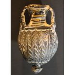 Eastern Mediterranean glass amphora with hand grips and final knob; the glass with blue and white