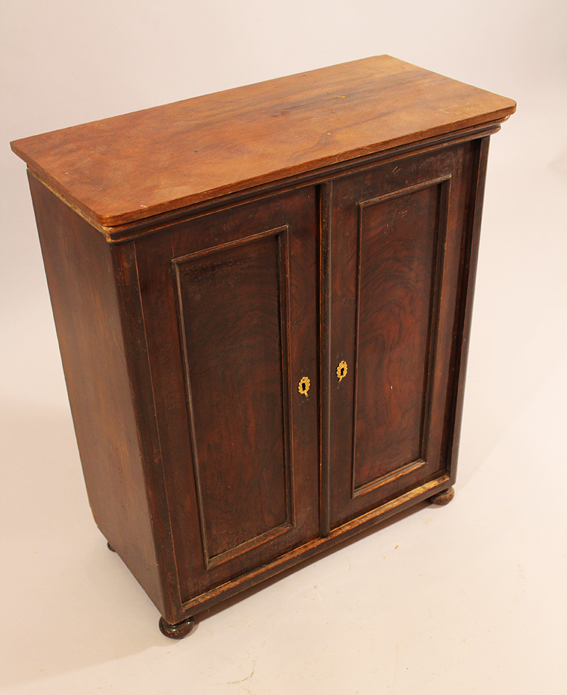 A puppet or miniature armoire with two doors and four turned legs; walnut on pinewood; inside four - Image 2 of 3