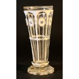 Bohemian glass beaker with white opaline on cutted glass, round canted foot; transparent; around