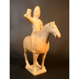 Chinese terracotta horse, with rider holding arms up and down; on integrated rectangular base; small