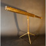 A travel telescope with glass lenses and gilded bronze mantle; adjustable, with two changable