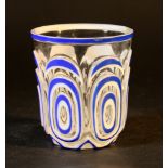Biedermeier opaline glass beaker, with blue and white geometrical ornaments on transparent glass;