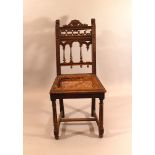 A historism wooden carved and turned chair; damages, parts missing; 19th Century.