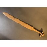 A possible Celtic small iron sword with restored blade, hand grip part; rusty; possible earth