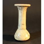 A glass vessel with conical body, long neck and extended boder rim; posible Roman, 2nd-3rd Century