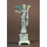 A bronze figure of the goddess Victory, winged, with crown and palm leaf, standing on a bowl, on