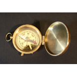 Small compass in gilded bronze mantle, described Epstein London, 20th Century.4,2cm diameter