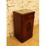 An Art Nouveau small chest with one door and one drawer, rounded borders, in the center a