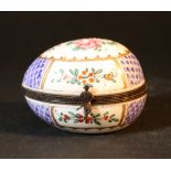 Porcelain box in shape of an egg, with lid and bronze mount, painted with flowers and decorations;