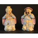 A pair of European porcelain boxes in shape of a Chinese couple; painted on white ground; Bohemia