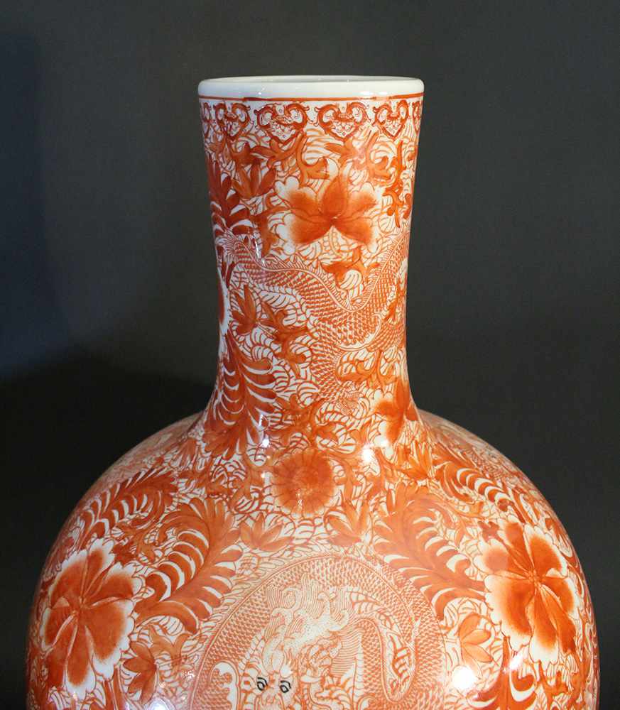 Chinese pair of porcelain vases; white ground with red painting of flowers and dragons; round form - Image 3 of 3