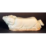 Chinese porcelain head rest, white porcelain with Seladon glaze; in form of a sleeping girl with