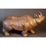 Chinese Yixing ceramic rhinoceros, naturalistically formed with big horn and folded decorated