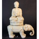 Chinese porcelain sculpture of Guanyin on an elephant; Blanc de Chine white porcelain; in lotus