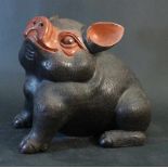 Chinese Yixing ceramic scultpure of a lucky pig; dark Yixing ceramic with some red parts; on the