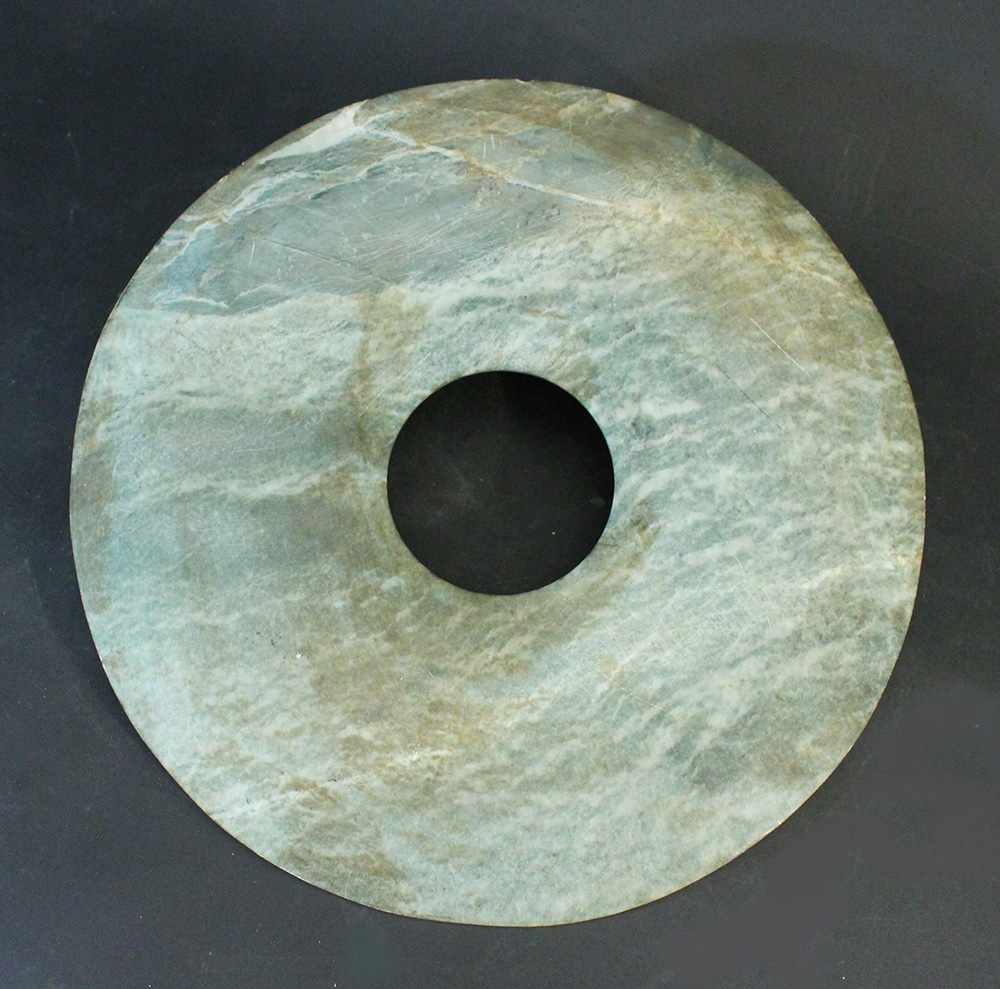 Chinese big Bi plate, green jade with natural veins; flat on both sides; maybe Han Dynasty (206b.