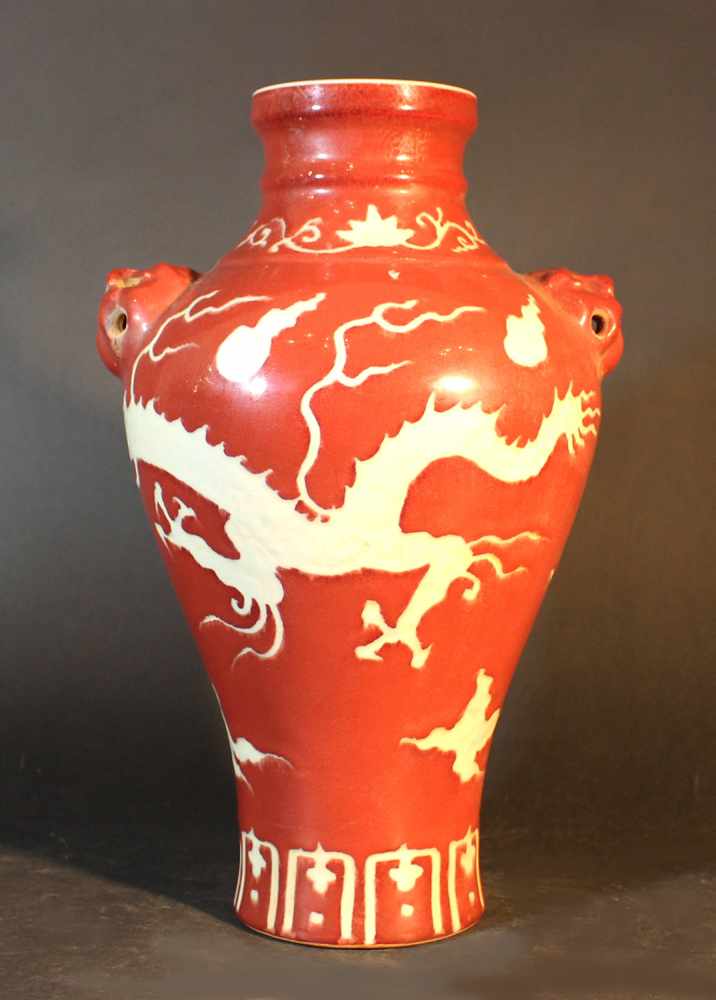 Chinese porcelain Baluster vase with red ground and white dragon, glazed; stepped neck; two hand - Image 3 of 3